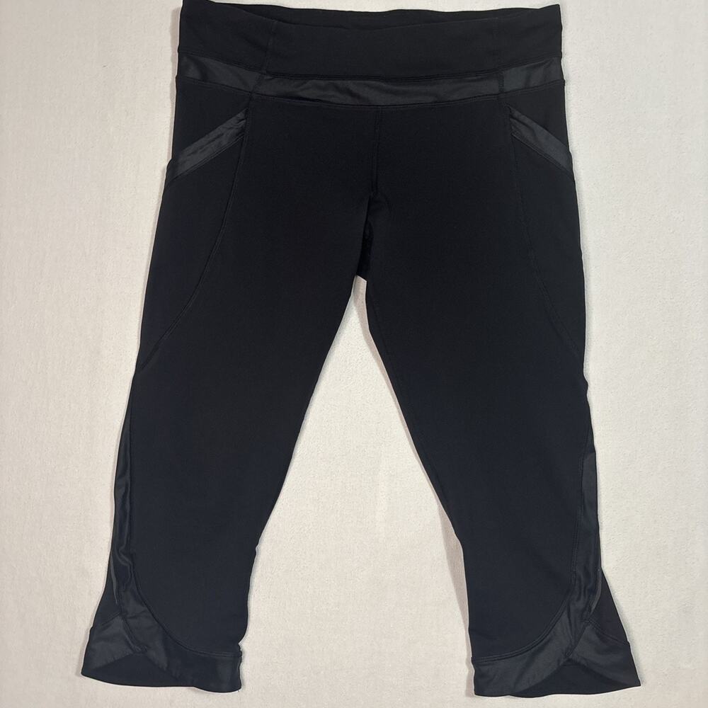 Lululemon Black Leggings (w/pockets). Size Medium Cropped